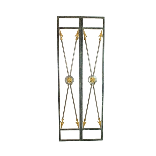 15 - GATES, a pair, 1940s French wrought iron, arrow and lion head design, approx 210cm x 77cm. (2)