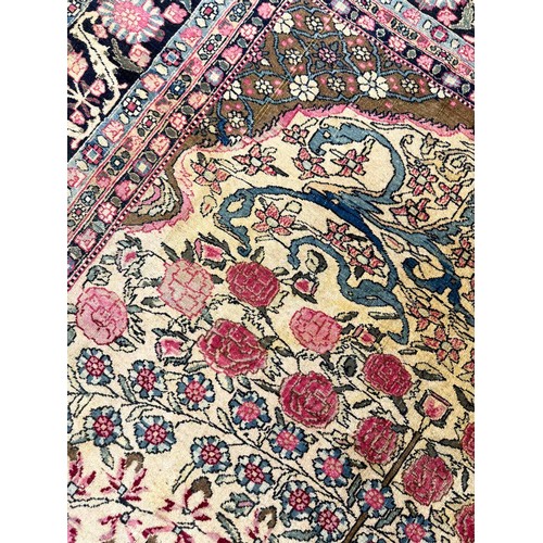 179A - ANTIQUE PERSIAN KERMAN RUG, 205cm x 142cm.