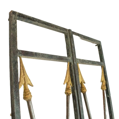 15 - GATES, a pair, 1940s French wrought iron, arrow and lion head design, approx 210cm x 77cm. (2)