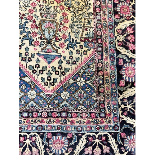 179A - ANTIQUE PERSIAN KERMAN RUG, 205cm x 142cm.