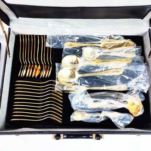 5A - CUTLERY SERVICE, 24ct gold plated, ten place setting with serving pieces, in fitted attache case.