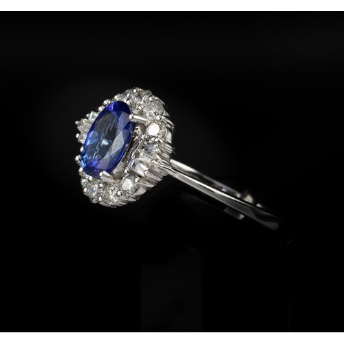 30A - CERTIFICATED 18CT WHITE GOLD OVAL-CUT TANZANITE AND RBC AND TAPERED BAGUETTE DIAMOND HALO RING, Tanz... 