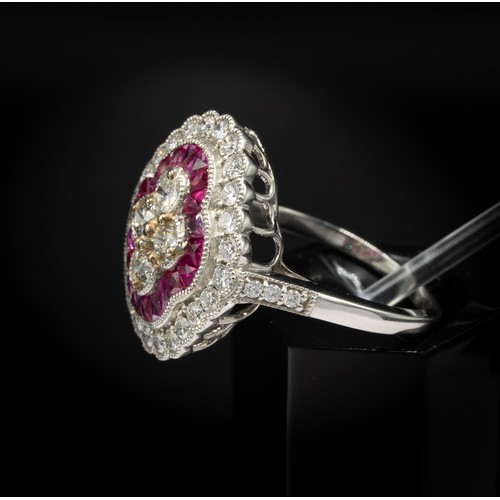 30C - PLATINUM VICTORIAN STYLE RUBY AND DIAMOND QUATREFOIL RING, set with round brilliant cut diamonds and... 