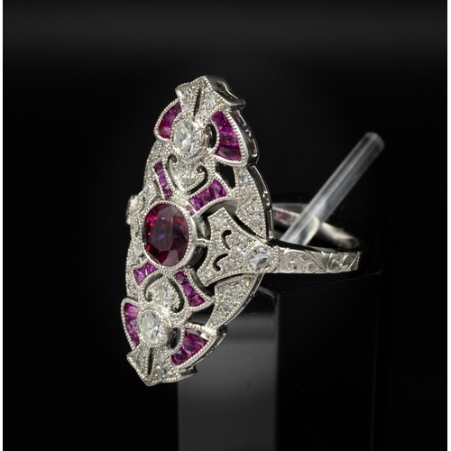 30D - PLATINUM EDWARDIAN-STYLE RUBY AND DIAMOND DRESS RING, with a beaded finish. Central round-cut ruby 0... 