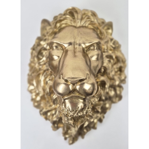 480 - LION HEAD WALL RELIEF PLAQUES, a pair, gilt finished resin, 40cm x 29cm. (2)