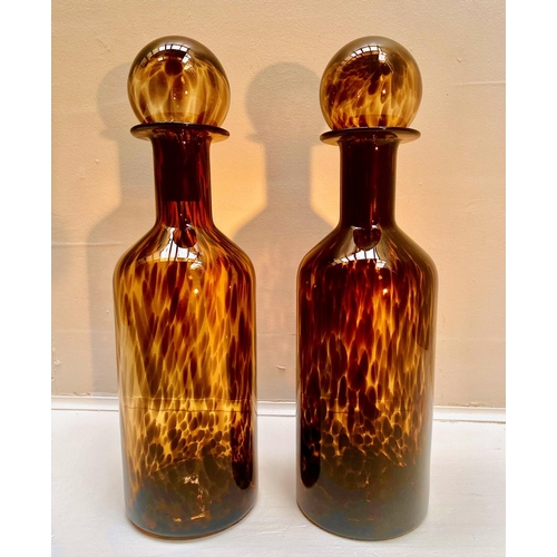 466 - DECANTERS, a pair, Murano style tortoiseshell glass, 53cm H x 14cm W x 14cm D. (2)