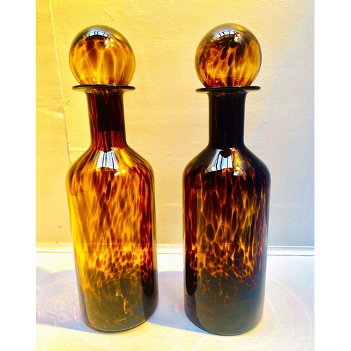 466 - DECANTERS, a pair, Murano style tortoiseshell glass, 53cm H x 14cm W x 14cm D. (2)