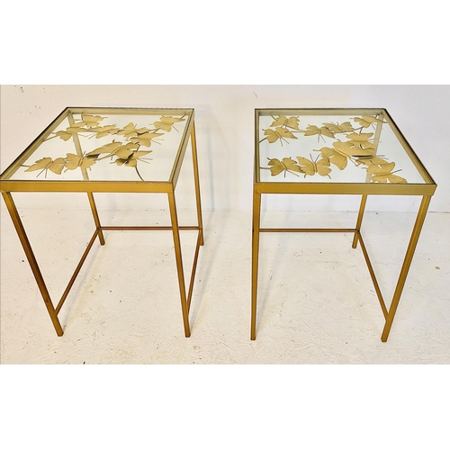 467 - SIDE TABLES, a pair, butterfly design, gilt metal and glass, 58cm H x 40cm W x 40cm D.