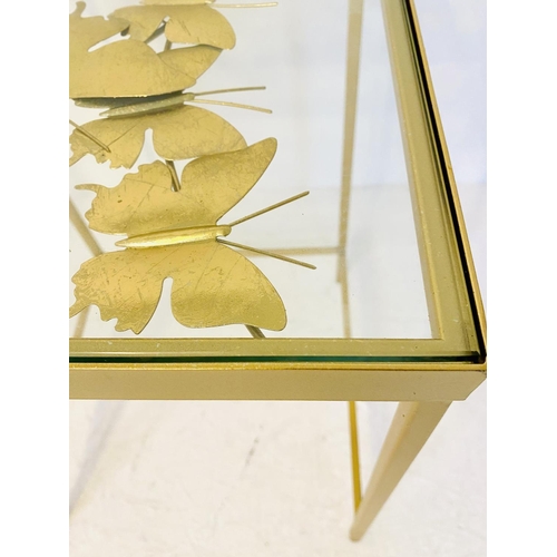 467 - SIDE TABLES, a pair, butterfly design, gilt metal and glass, 58cm H x 40cm W x 40cm D.