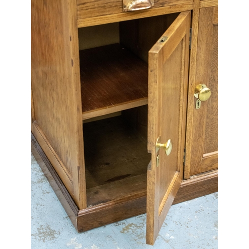 212A - SIDEBOARD, circa 1920, oak with five drawers above five doors, Provenance: Kings College, London, 88... 