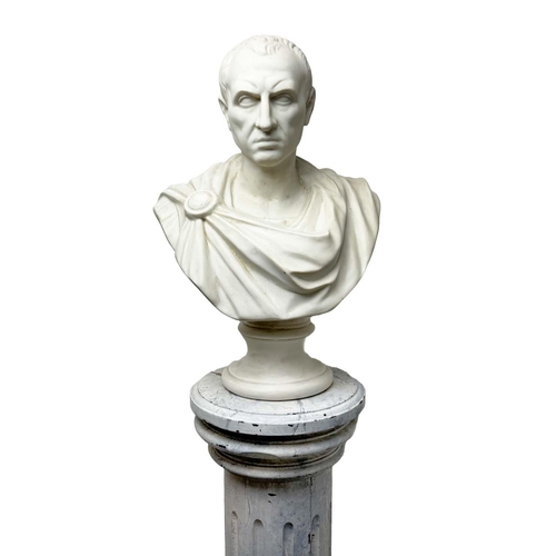 1 - BUST OF JULIUS CAESAR, 20th century plaster on a 19th century faux marble painted stand, bust 60cm H... 