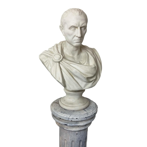 1 - BUST OF JULIUS CAESAR, 20th century plaster on a 19th century faux marble painted stand, bust 60cm H... 