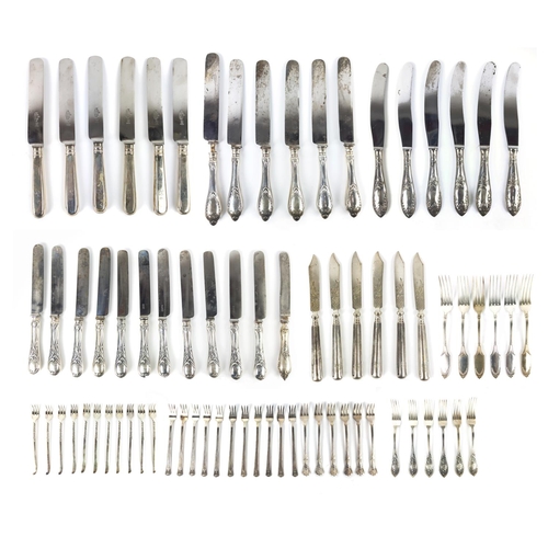 11 - A SMALL COLLECTION OF WHITE METAL CUTLERY, including Russian silverware, comprising multiple sets of... 