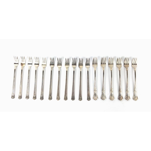 11 - A SMALL COLLECTION OF WHITE METAL CUTLERY, including Russian silverware, comprising multiple sets of... 