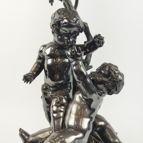 13 - A SILVER PLATED FIGURAL EPERGENE, in the form of cherubs, grapevine decoration, 46cm H.