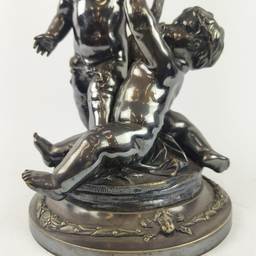 13 - A SILVER PLATED FIGURAL EPERGENE, in the form of cherubs, grapevine decoration, 46cm H.