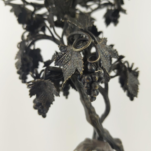 13 - A SILVER PLATED FIGURAL EPERGENE, in the form of cherubs, grapevine decoration, 46cm H.