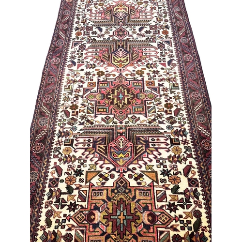 189 - FINE PERSIAN KARAJA RUNNER, 390cm x 96cm.