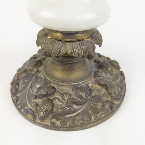 19 - SNAKE LAMP IN THE MANNER OF SAINT LOUIS, 19th century opaline glass with coiled green snake on bronz... 