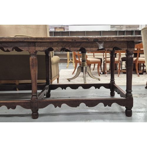 204 - REFECTORY TABLE, 17th century Italian walnut, on six turned supports with scalloped apron and cross ... 