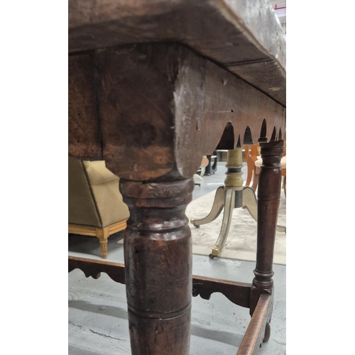 204 - REFECTORY TABLE, 17th century Italian walnut, on six turned supports with scalloped apron and cross ... 