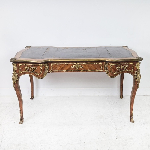 213 - BUREAU PLAT, French kingwood, circa 1880, with an inlaid leather writing surface and ormolu mounts w... 