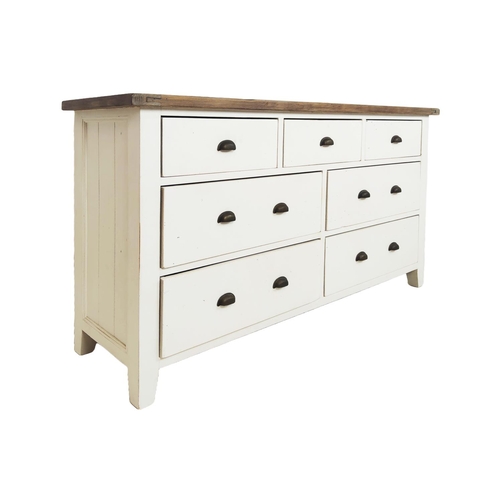 221 - BANK OF DRAWERS, Rustic reclaimed wood, white painted base with an arrangement of seven drawers and ... 