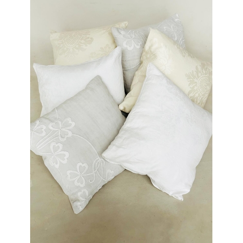 242 - CUSHIONS, a collection of six, including embroidered linen, damask linen and silk, 45cm x 45cm. (6)