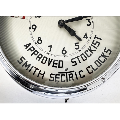 244 - RETAILERS ELECTRIC TIMEPIECE FOR SMITH SECTRIC, mid 20th century circular chrome framed with illumin... 