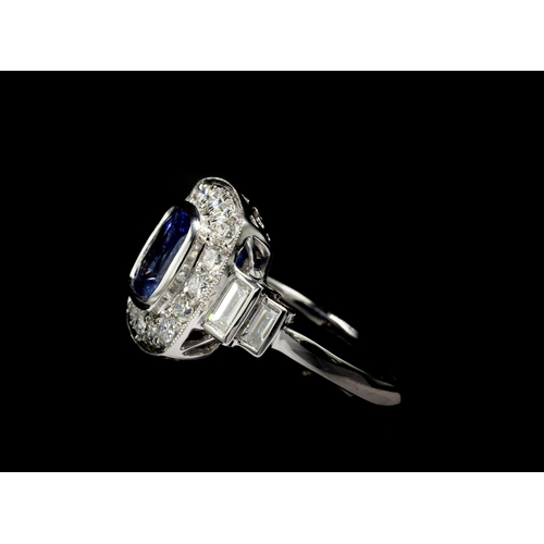 30E - PLATINUM ART DECO STYLE RING SET, with a cushion-cut sapphire surrounded by round brilliant cut diam... 