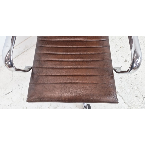 355 - AFTER CHARLES AND RAY EAMES STYLE ALUMINIUM GROUP CHAIR, brown leather and adjustable, 57cm W.