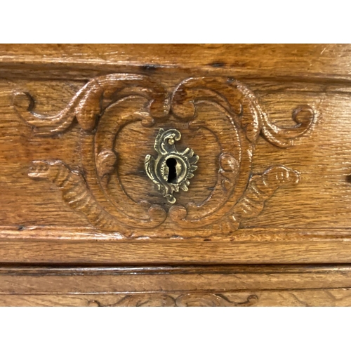 384 - COMMODE, Louis XV, mid 18th century oak, with three long drawers, with key, 97cm H x 133cm W x 58cm ... 