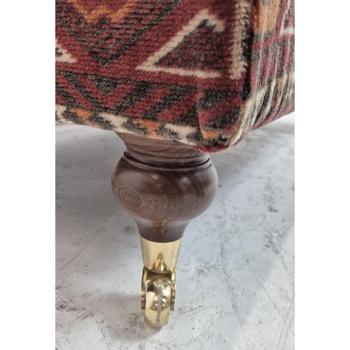 422 - HEARTH STOOL, rectangular carpet covered with brass castors, 30cm H x 106cm x 55cm D.