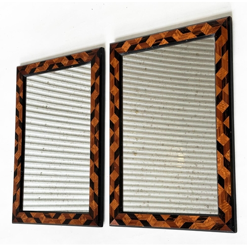 426 - WALL MIRRORS, a pair, early 20th century rectangular specimen wood parquetry frames with mottled pla... 