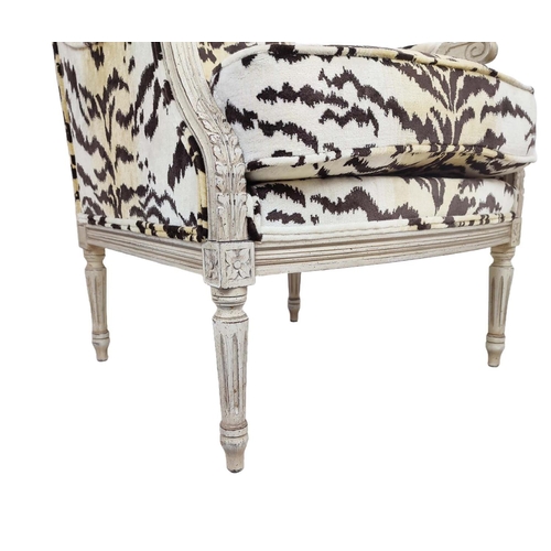 462 - ANDREW MARTIN BERGERE ARMCHAIRS, a pair, in animal print velvet, each 66cm x 100cm H x 70cm. (2)