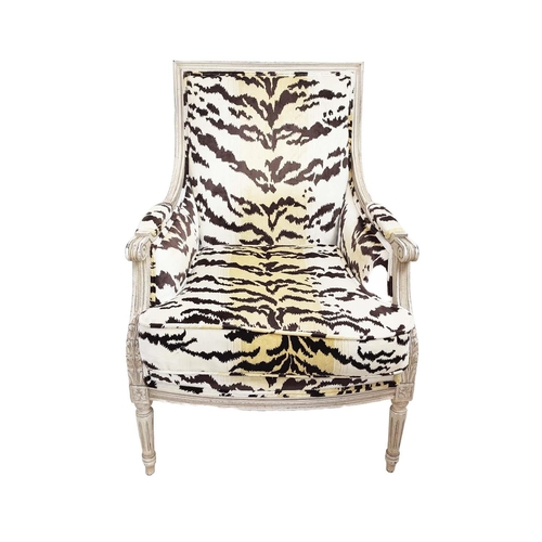 462 - ANDREW MARTIN BERGERE ARMCHAIRS, a pair, in animal print velvet, each 66cm x 100cm H x 70cm. (2)