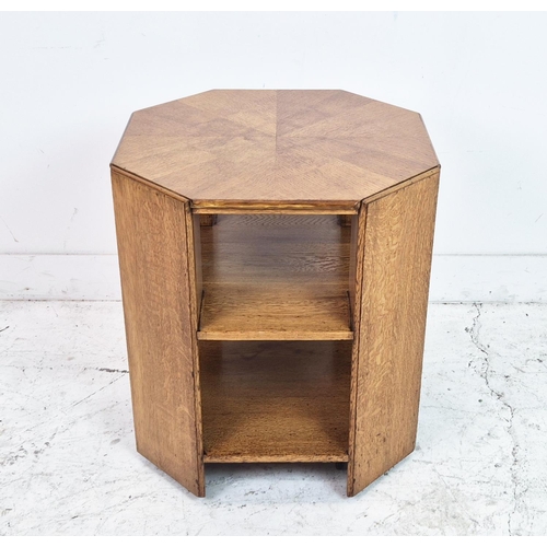 474 - MAPLE & CO BOOKCASE, circa 1920, oak of octagonal form on castors, labelled, 57cm H x 55cm.