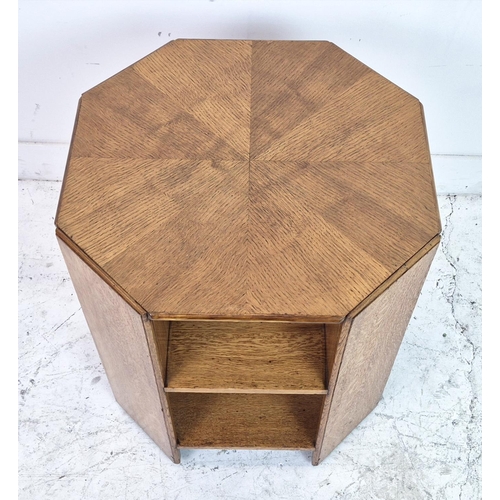 474 - MAPLE & CO BOOKCASE, circa 1920, oak of octagonal form on castors, labelled, 57cm H x 55cm.