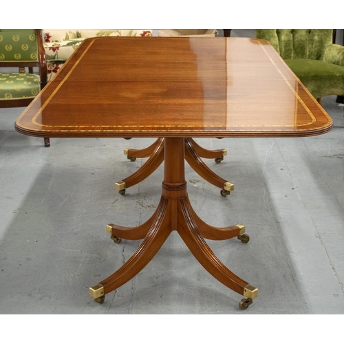 478 - ATTRIBUTED TO WILLIAM TILLMAN DINING TABLE, mahogany and satinwood banded on twin pedestals, with ex... 