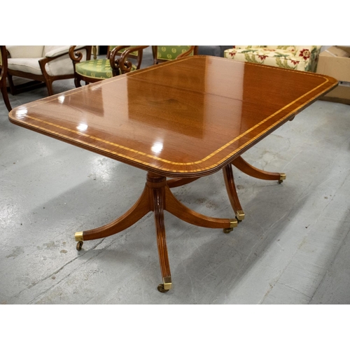 478 - ATTRIBUTED TO WILLIAM TILLMAN DINING TABLE, mahogany and satinwood banded on twin pedestals, with ex... 