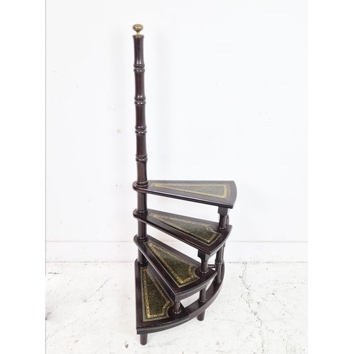 483 - LIBRARY STEPS, mahogany and brass with green leather spiral treads, 111cm H x 43cm.