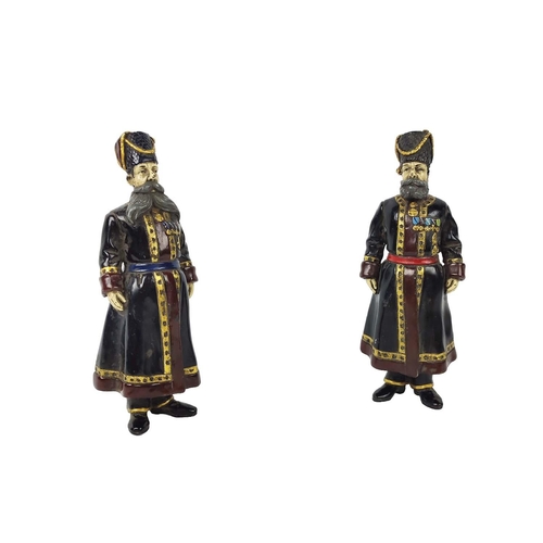 490 - Russian Cossacks, two differing, painted cast metal, 19cm H at tallest approx, (2)