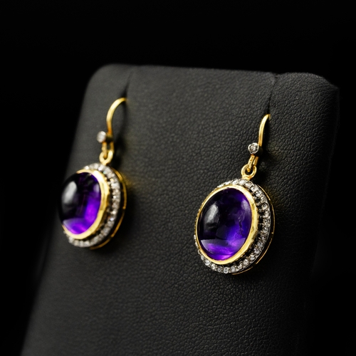 12 - A PAIR OF SILVER GILT OVAL CABOCHON AMETHYST AND DIAMOND HALO DROP EARRINGS, boxed, amethysts 2.70ct... 