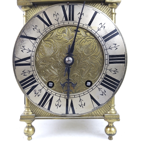 27 - MANTLE CLOCK, 17th century style brass with a large bell to top, 40cm H.