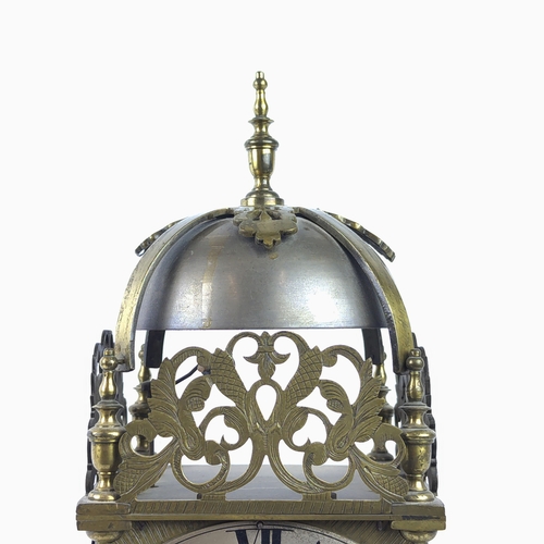 27 - MANTLE CLOCK, 17th century style brass with a large bell to top, 40cm H.