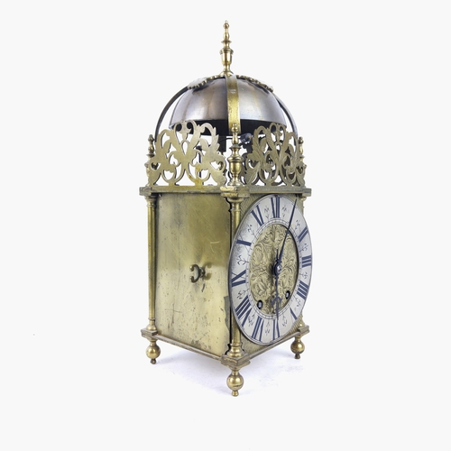 27 - MANTLE CLOCK, 17th century style brass with a large bell to top, 40cm H.