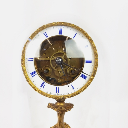 28 - MANTEL CLOCK, French early 19th century Rococo style, gilt bronze, glass dome and circular base.