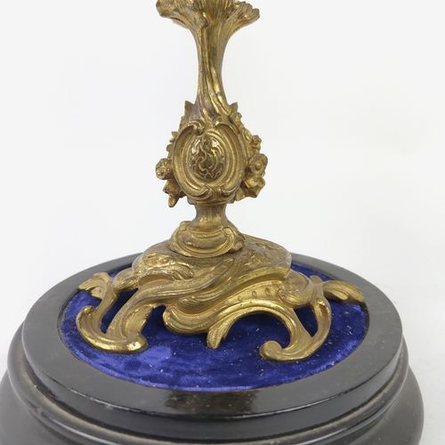 28 - MANTEL CLOCK, French early 19th century Rococo style, gilt bronze, glass dome and circular base.