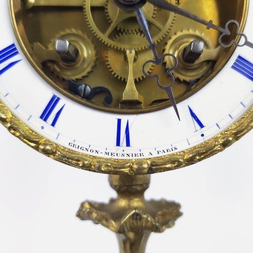 28 - MANTEL CLOCK, French early 19th century Rococo style, gilt bronze, glass dome and circular base.