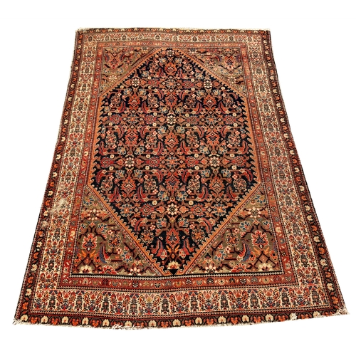 302 - ANTIQUE MALAYER RUG, 193cm x 137cm.